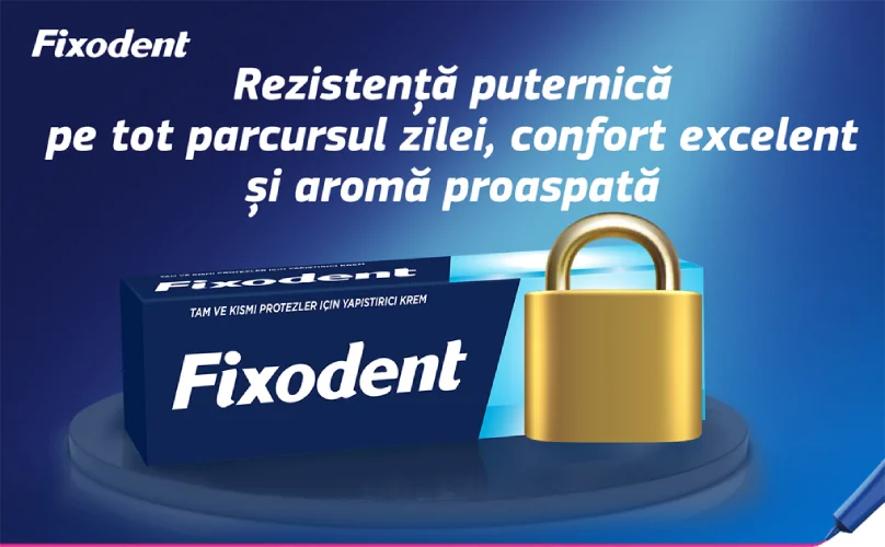 Cutie Fixodent cu un lacat pe fundal albastru. Cutie Fixodent cu un lacat pe fundal albastru.