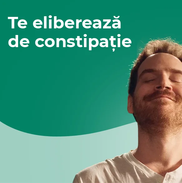 femeie imbracata in verde care danseaza