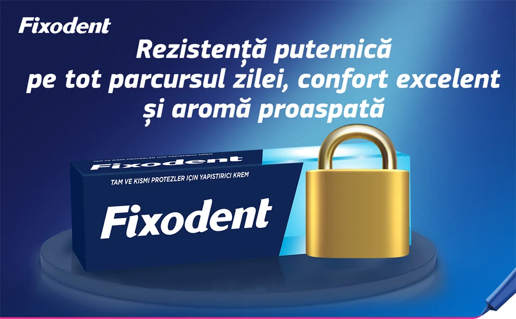 Cutie Fixodent cu un lacat pe fundal albastru. Cutie Fixodent cu un lacat pe fundal albastru.