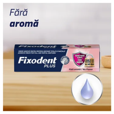 Cutie de Fixodent crema adeziva pentru proteza dentara, varianta Complete, aroma proaspata, langa frunze de menta. Cutie de Fixodent crema adeziva pentru proteza dentara, varianta Complete, aroma proaspata, langa frunze de menta.