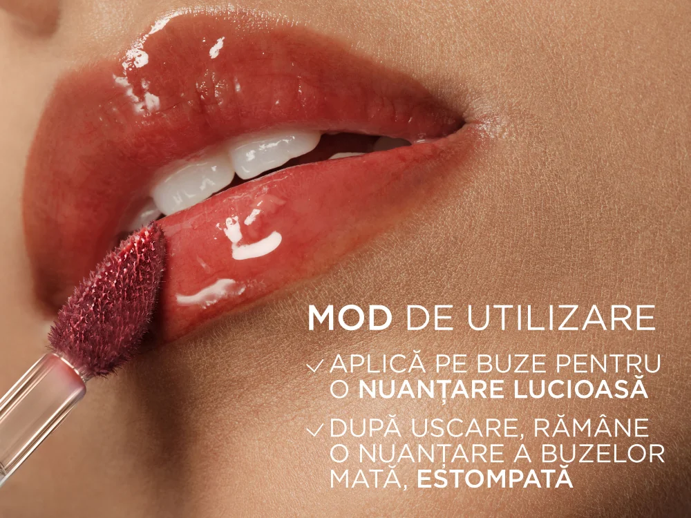 Aplicare luciu de buze Hyaluron Tint 601 Worth It, L’Oreal Paris, care ofera initial efect lucios, apoi se usuca si lasa o culoare mata, naturala.