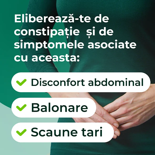 femeie imbracata in verde care se tine de stomac