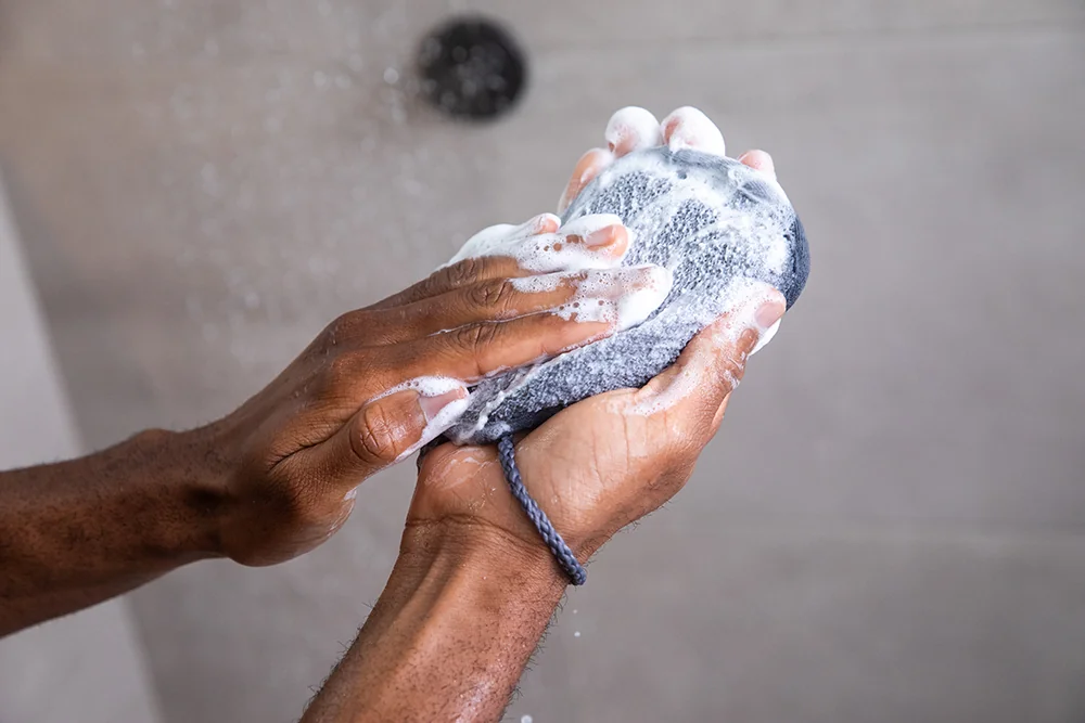 Manusa exfolianta pentru corp cu buzunar pentru sapun Sport, 1 bucata, Cleanlogic