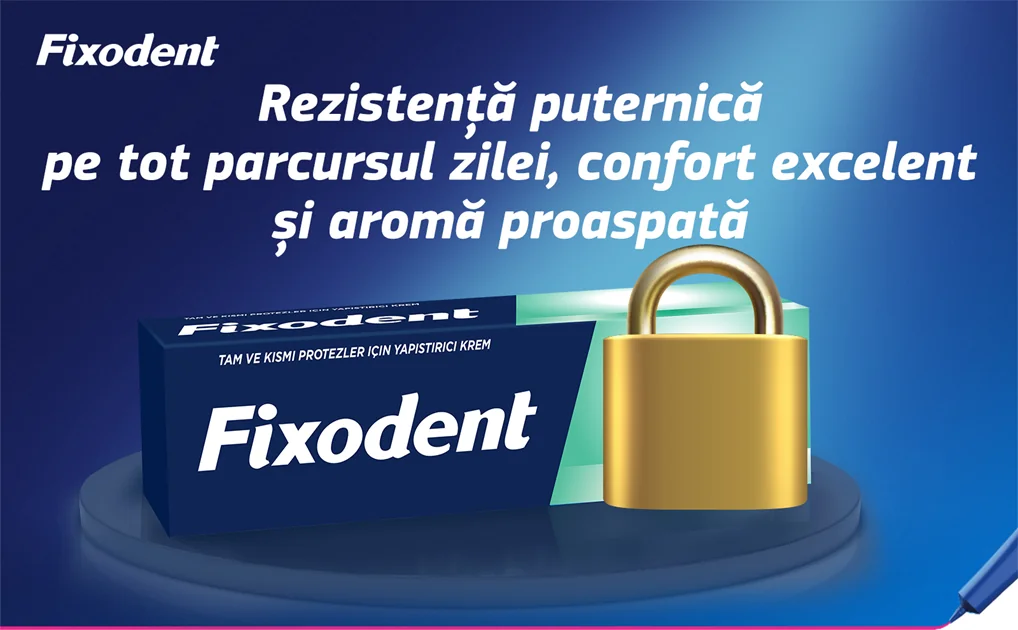Cutie Fixodent cu un lacat pe fundal albastru. Cutie Fixodent cu un lacat pe fundal albastru.