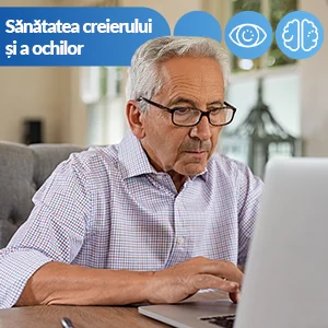 Barbat cu ochelari care lucreaza la laptop - Sanatatea creierului si a ochilor Barbat cu ochelari care lucreaza la laptop - Sanatatea creierului si a ochilor