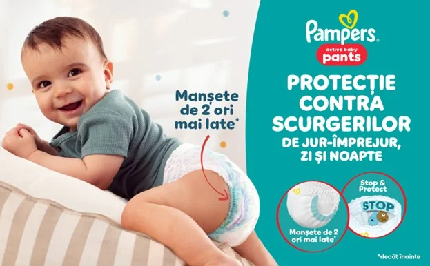 Protectie impotriva scurgerilor bebelus care e imbracat cu pampers Protectie impotriva scurgerilor bebelus care e imbracat cu pampers